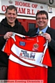 LOOKING FOWARD TO THE CHALLENGE . . . Phil Costin (left), appointed as Oldham reserve team coach Paul Ashton’s No.2, is congratulated by Roughyeds chairman Chris Hamilton. 

