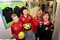VICKY Cunningham (right) and colleague Paula Revell, with young volunteers Zack Pilkington (left) and Brandon Adams, who have been volunteering at Springhead AFC.