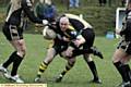 HITCHING A RIDE . . . Eric Johnson, of Oldham St Anne’s, has Mike Gill on his back. 
