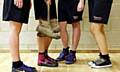 SPORTS shoes down the ages — one of the pictures on display 