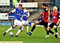 ON THE STRIKE: Dale Stephens (left) lines up a shot against Colchester. 

