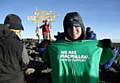 Mark Royle at the summit of Kilimanjaro 
