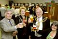 CHARITY tipple . . . (from the left) Saddleworth Parish Council chairman Councillor Bill Cullen and consort Enid Firth with Oldham Mayor and Mayoress, David and Jean Jones 
