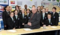 Principal Sir Iain Hall with pupils at Oasis Academy. 

