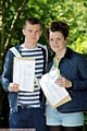 Olympic swimming hopeful Jessica Lloyd and Oldham Athletic starlet Joe Cooper celebrate their results at Saddleworth School
