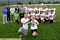 HERE WE GO: Shaun Dean, captain of Great Horned Owls, and Shaw Magpies and Crompton Ladies skipper Rachel Hurst with their rounders teams at Crompton Cricket Club.  
