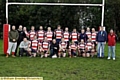 ON PARADE: players and officials from Higginshaw ARLFC line-up before their game against Langworthy Reds in the North-West Counties League. 