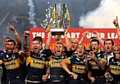 LIFT-OFF: Kevin Sinfield raises the Super League trophy. 