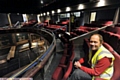 WEll, that's better: Artistic director Kevin Shaw tries out the comfy new Coliseum seats 