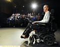 Disabled actor Andy Walker talks to students at Grange Arts Centre. 
