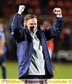Manager Paul Dickov celebrates after a morale-boosting 2-0 win. 