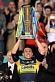 Leeds skipper Kevin Sinfield collects the Super League trophy 
