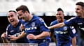 MAGIC MOMENT: Baxter celebrates his goal with his ecstatic team-mates. 