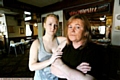 ROBBED of trust: April Grimes (right), landlady of The Britannia Tavern, Hollins, with daughter Katie Jones 
