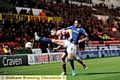 GET BACK: Athletic forward Matt Derbyshire attempts to nick the ball away from his Doncaster Rovers rival. 