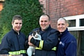 FRIENDS reunited: Charlie with his rescuers (from left) Kirk Richards, Derek Ridley and Tony Cuschlra