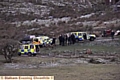 POLICE gathered as the incident moved to open land 

