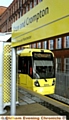 THE TRAM NOW ARRIVING: the first tram stops at the new Shaw and Crompton station. 