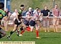 GO, Gorey, go: Oldham’s Andy Goreysprints towards the Littleborough line. 
