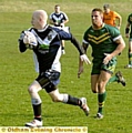 FITTON Hill’s Carl Molloy breaks away during his side’s 37-18 loss to Woolston Rovers ‘A’ in North-West Counties League Division Four. More details in Thursday’s Chronicle. 

