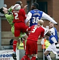 UP AND AT ‘EM . . . Oumare Tounkara gets stuck in against tonight’s opponents, Leyton Orient, last season. 
