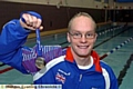 SILVER SHOW . . . Ben Procter shows off his medal from the 200 metres freestyle final at the British Championships. 