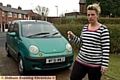 Disgruntled . . . Lynsey Evans with the Daewoo Matiz that developed a string of faults. She has since scrapped the car 
