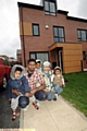 MORE space: Minzur Chowdhury and Wajida Begum with their children Moonei, Emad and Zaidan outside their new house in Mackintosh Way 

