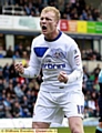 Robbie Simpson shows his emotion after earning Athletic a point at Wycombe. 