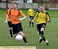 BEST FOOT FORWARD . . . Moorside’s Lee Rowbotham crosses the ball. 