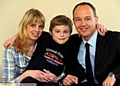 Edward with his parents Heidy and Paul 
