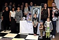 Charlie is pictured (right) with his partner Louise Howard, alongside family and friends at the fun day. 
