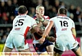 NOWHERE TO GO: Oldham’s Alex Thompson runs into St Helens pair Carl Forster (left) and Shaun Magennis. 