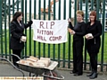 Fitton Hill Comprehensive demolition, Amanda Bullen, Lorraine Carter and Dawn Whipp get a souvenir brick from the site. 