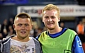 Crossbar Challenge winner Ashley Kershaw with Latics’ Robbie Simpson 
