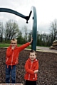 Brothers Malachi Pearson (l) and Luca Pearson miffed after kids have set fire to swings on new playground off Wellyhole St Greenacres.