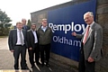 LIFELINE: (l-r) Mike Braddock (OBLG), Steve Bottomley (Remploy commercial manager), Councillor Shoab Akhtar (Deputy Leader of Oldham Council), Patrick Mellor (Remploy factory manager) and MP Michael Meacher 
