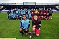 PRIDE IN BATTLE . . . Coppice captain Shehyrar Rashid (left) and his opposite number at FC Radclyffe, Mark Terris, with the Challenge Cup as the two teams look on at Boundary Park. 