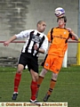 HEADS UP: Rifle Range C’s Ash Robinson (right) rises above Steven Ormerod, of Famous King George ‘B’. 