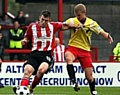 RED-HOT REEVES . . . striker Damien Reeves (left) averaged more than a goal a game for Altrincham last season. 