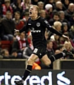 ROBBIE Simpson celebrates scoring at Anfield. 