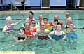 STAYING afloat . . . Shaw and District Disabled Association swimming class has been saved by a charity grant from Forever Manchester 
