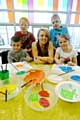 GETTING involved: Chronicle reporter Erin Heywood takes part in arts and crafts activities with Mahdlo members (from left) Callum McCrae, Ben Holmes, Lewis Roberts and Caitlin Stanley 