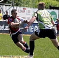 EYE CONTACT: Oldham’s Danny Whitmore attempts to side-step his South Wales Scorpions opponent. 