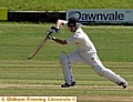 BAT’S THE WAY TO DO IT . . . Alan Durose sets an example on his way to 35 against Norden.