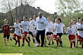FOLLOW ME . . . Ray Wilkins puts the pupils through their paces. 