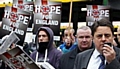 TWEET: BNP leader Nick Griffin (right) 

