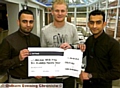 ALL YOURS . . . Chronicle Star Man Robbie Simpson receives this season’s Indish Restaurant Bar and Grill-sponsored charity cheque from Jawad Mukhtar (left) and Rabat Mukhtar. 