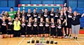 LOOK what we won . . . North East Manchester Hawks celebrate claiming eight trophies at the National Sports Centre.