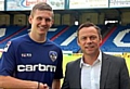 DANIEL TAYLOR is welcomed to Boundary Park by Latics boss Paul Dickov.